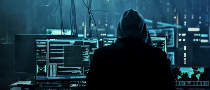 Hacker on computer
